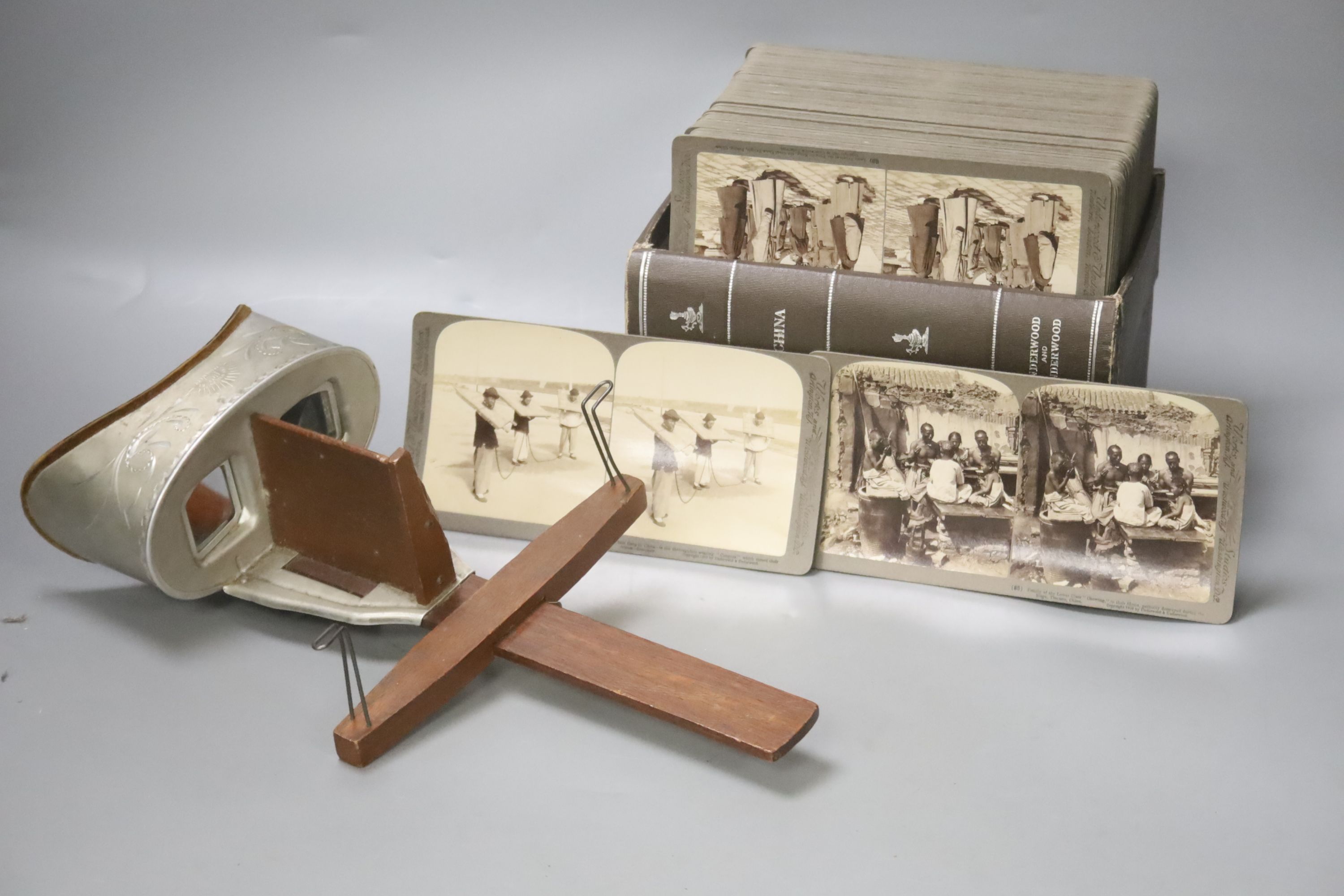 A 'Sun Sculpture' stereoscopic viewer and a large collection of Underwood and Underwood stereoscopic cards, many depicting Chinese